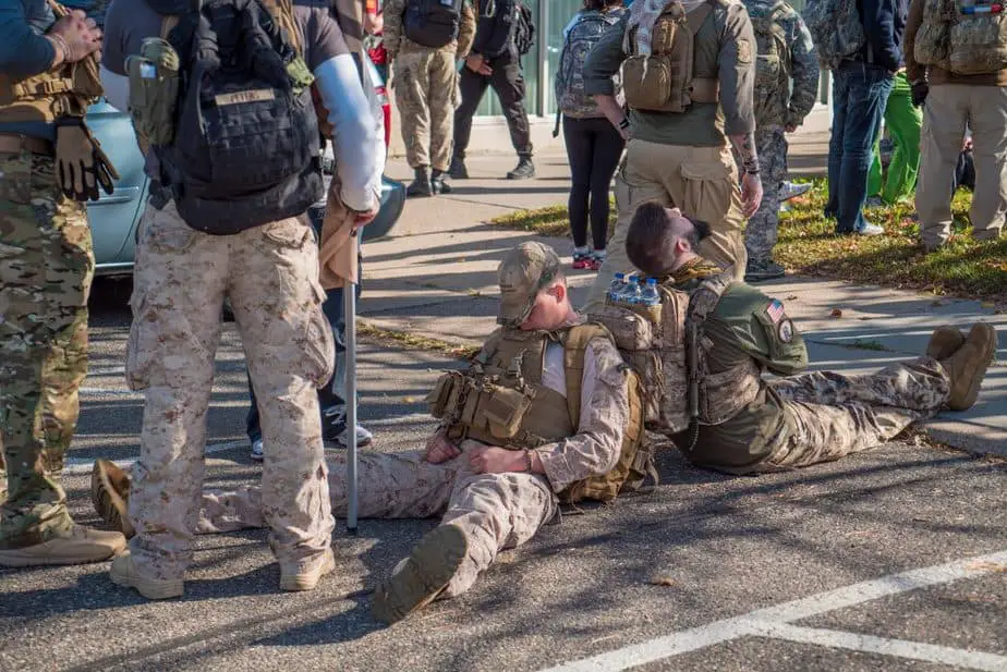 Soldiers sleeping in a seated position