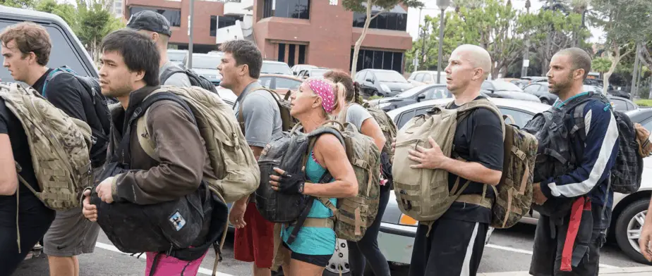 Group of people rucking in an event | Ruck Event