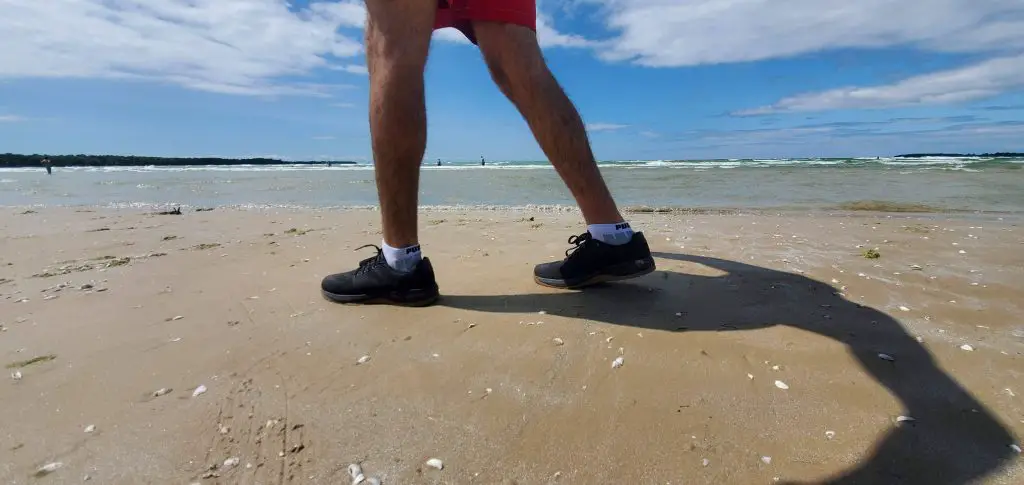 Walking on sand while wearing the GORUCK Ballistic Trainers to review