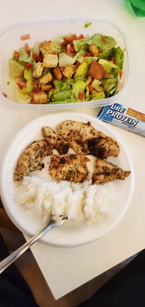 Rice, grilled chicken, and salad meal that i relied on to lose weight through rucking.